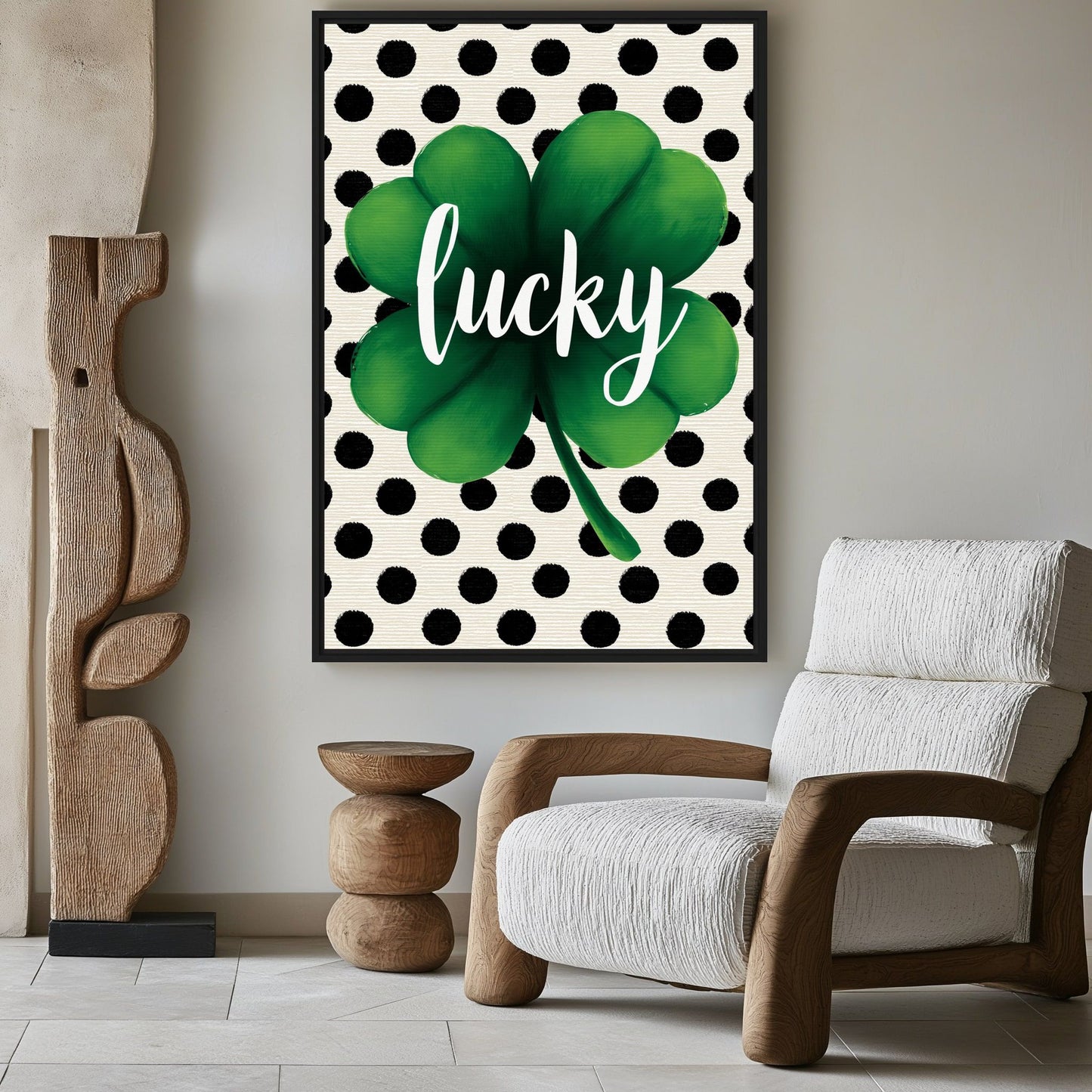 Green four-leaf clover with white lucky script and black dots above a cream armchair beside carved wood decor