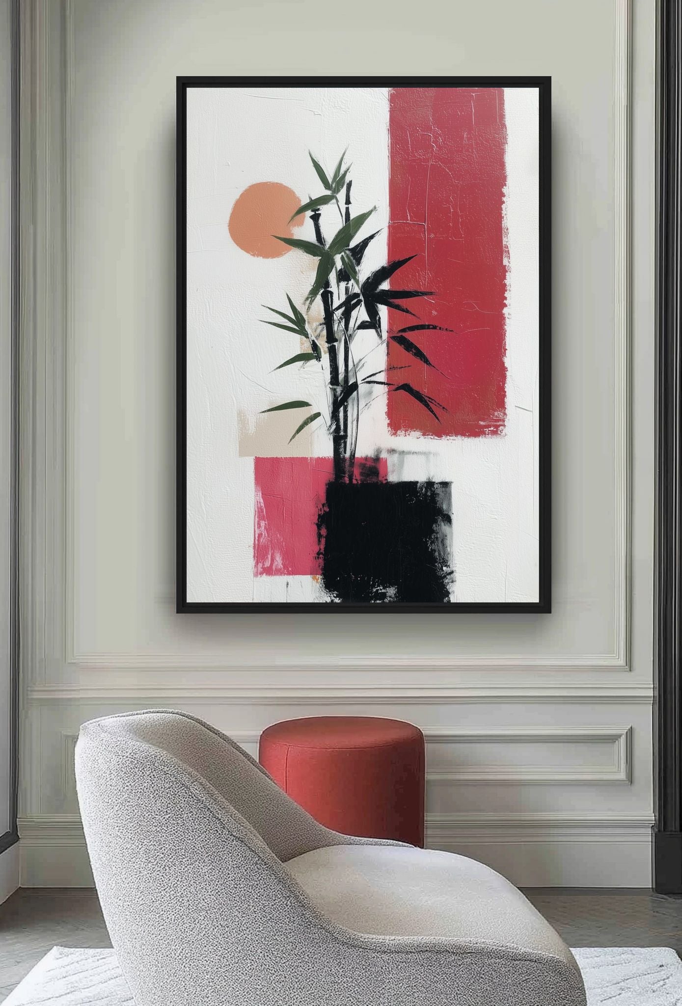 Abstract bamboo artwork in black, green, red and orange above a curved white chair and red stool