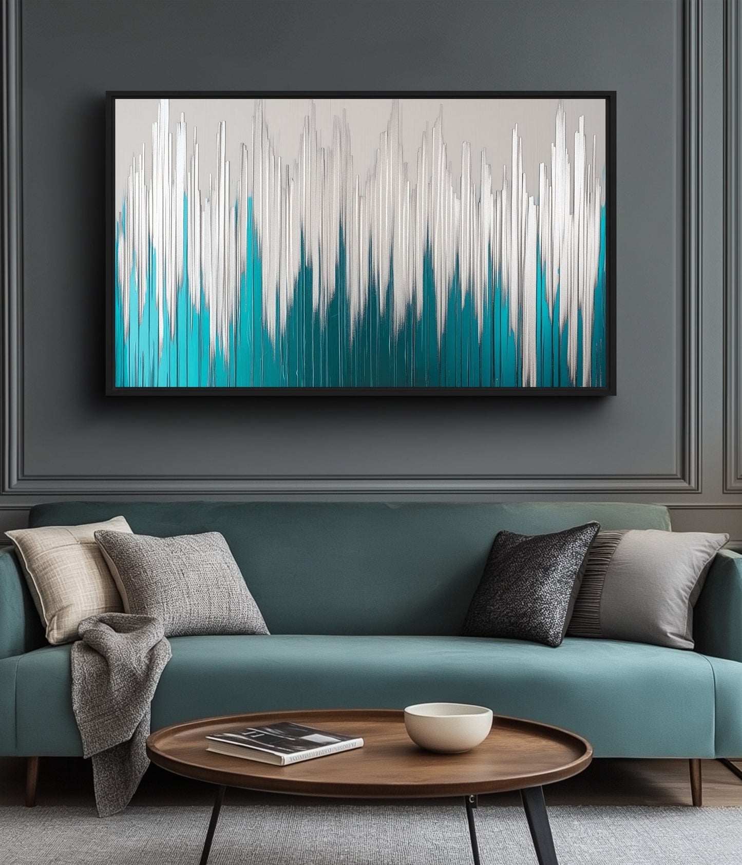 Teal, white and gray abstract artwork above a teal sofa with neutral cushions and an oval wooden table
