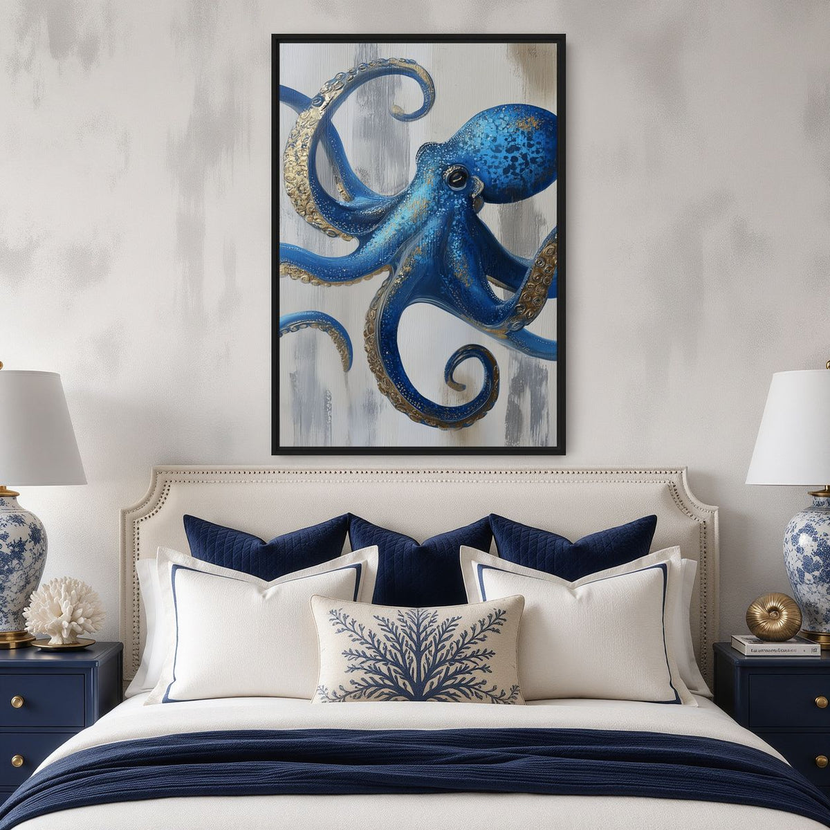 Bedroom mockup of blue octopus artwork above cream upholstery and navy bedding