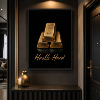 Gold-bar motivational canvas above a dark console and gold-toned vase