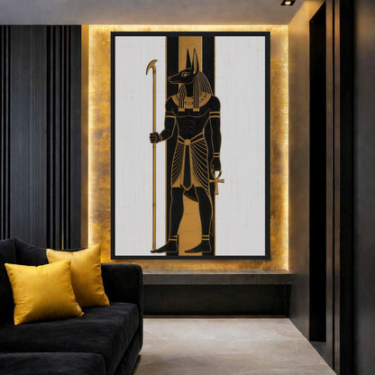 Dark lounge mockup of Anubis artwork beside a black sofa and yellow cushion
