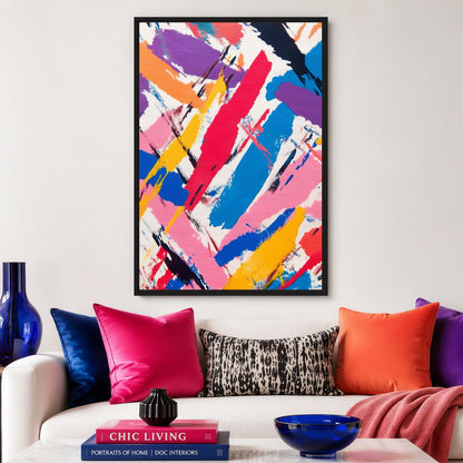 Colourful brushstroke canvas above a sofa with bright pink and orange cushions