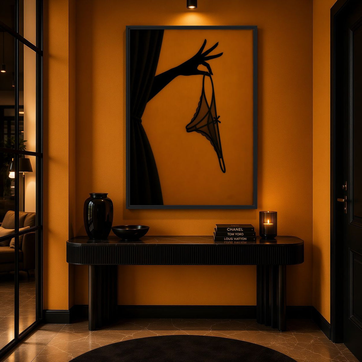 Black and amber lingerie canvas above a dark console on an orange wall