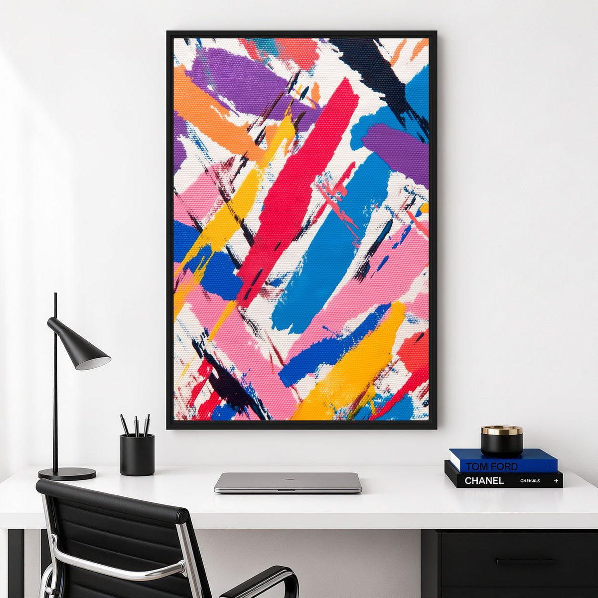 Bright abstract brushstroke canvas above a white home-office desk