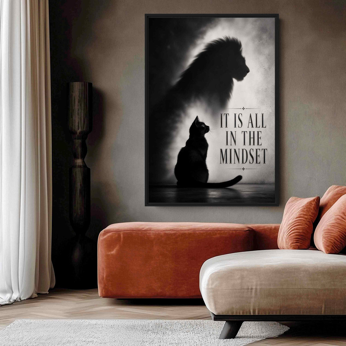 Black cat mindset artwork above orange and cream seating