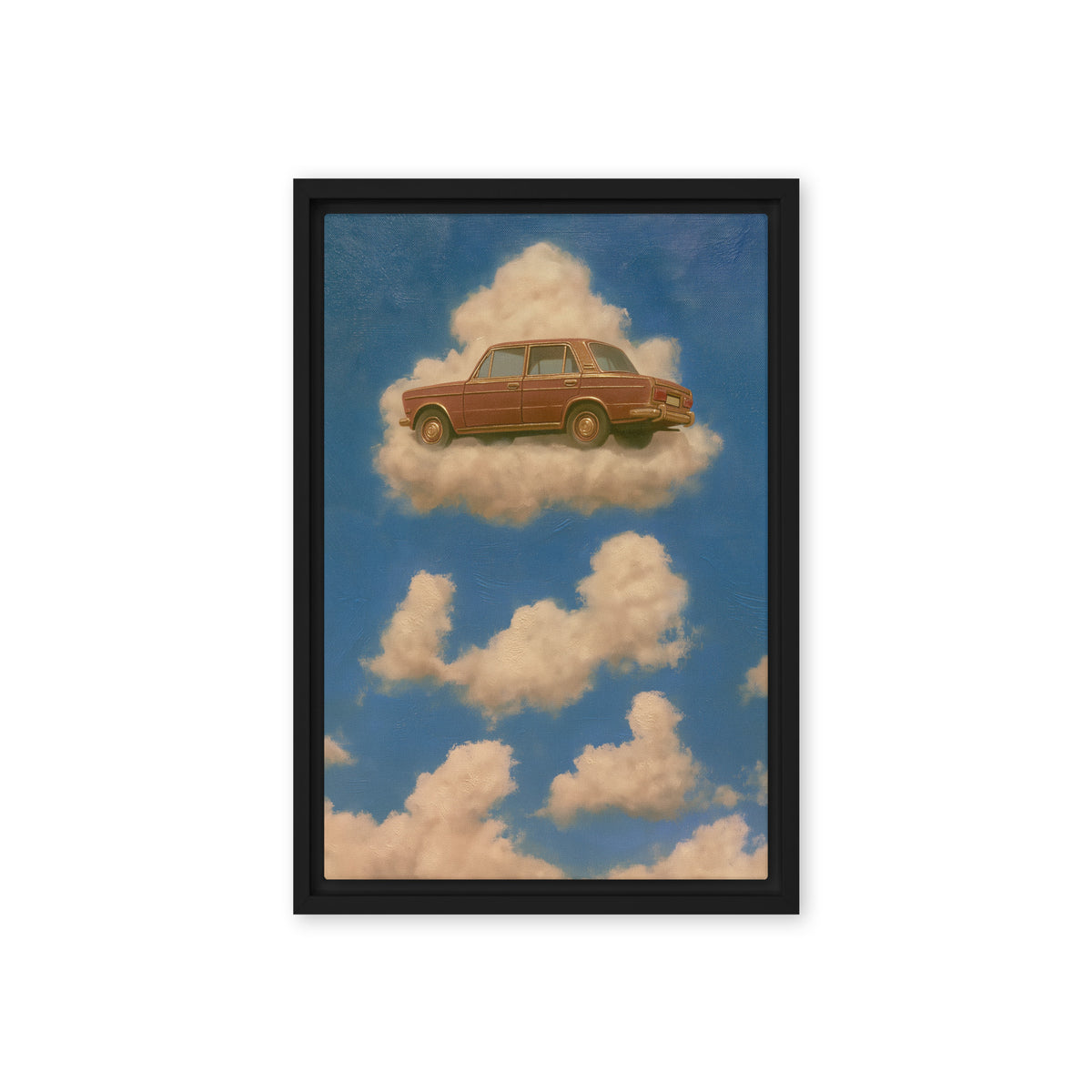 A rust-brown vintage sedan floats on a cream cloud in a blue sky; front view in a black frame, 12 x 18 in canvas