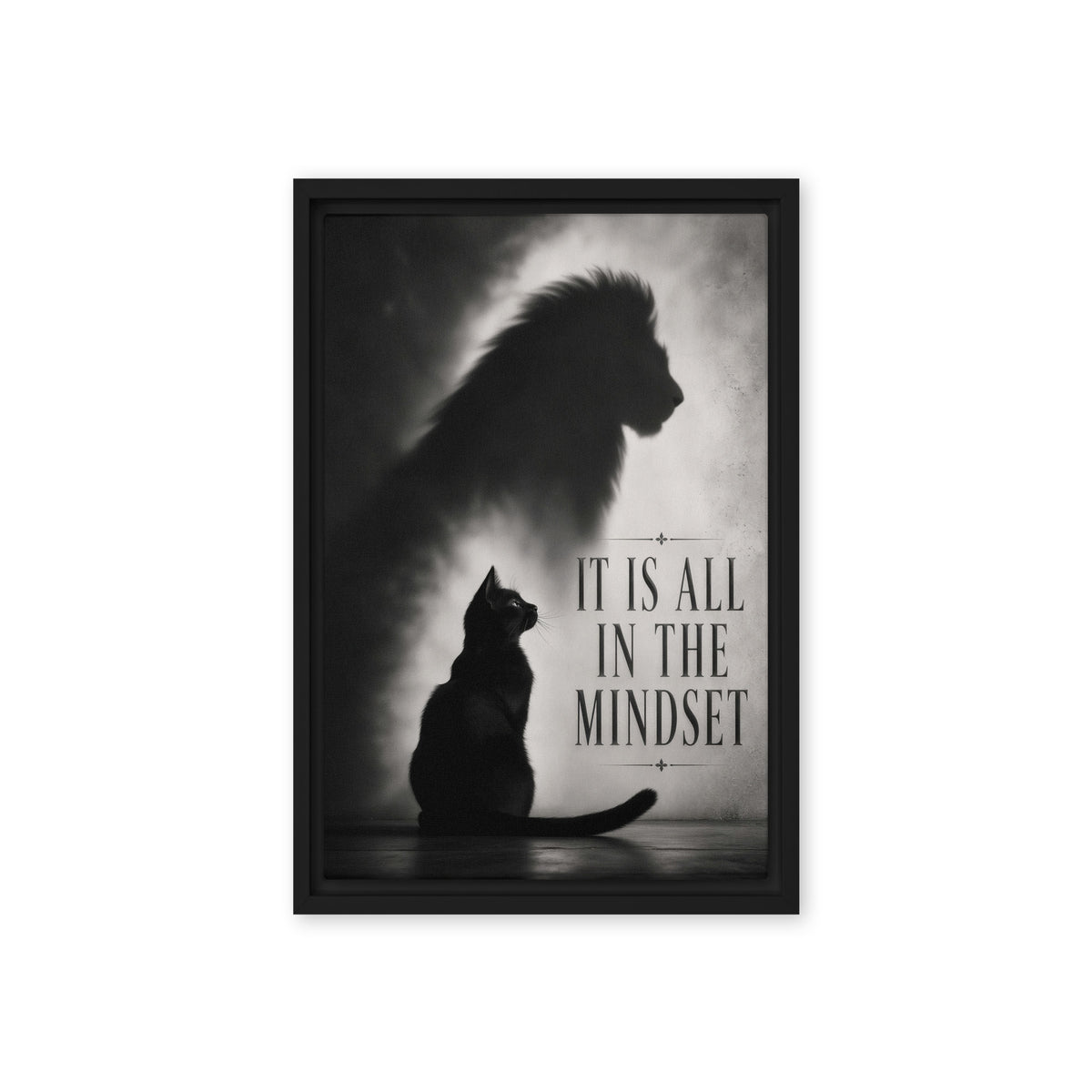 A sitting black cat casts a large lion-shaped shadow beside the words It Is All in the Mindset; front view in a black frame, 12 x 18 in canvas