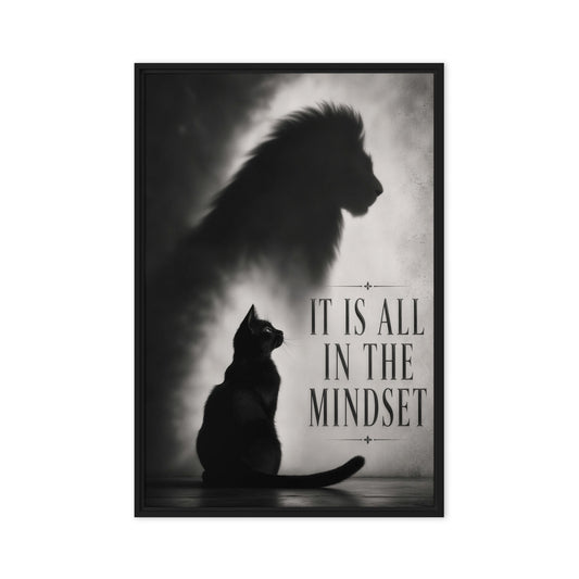 A sitting black cat casts a large lion-shaped shadow beside the words It Is All in the Mindset; front view in a black frame, 24 x 36 in canvas
