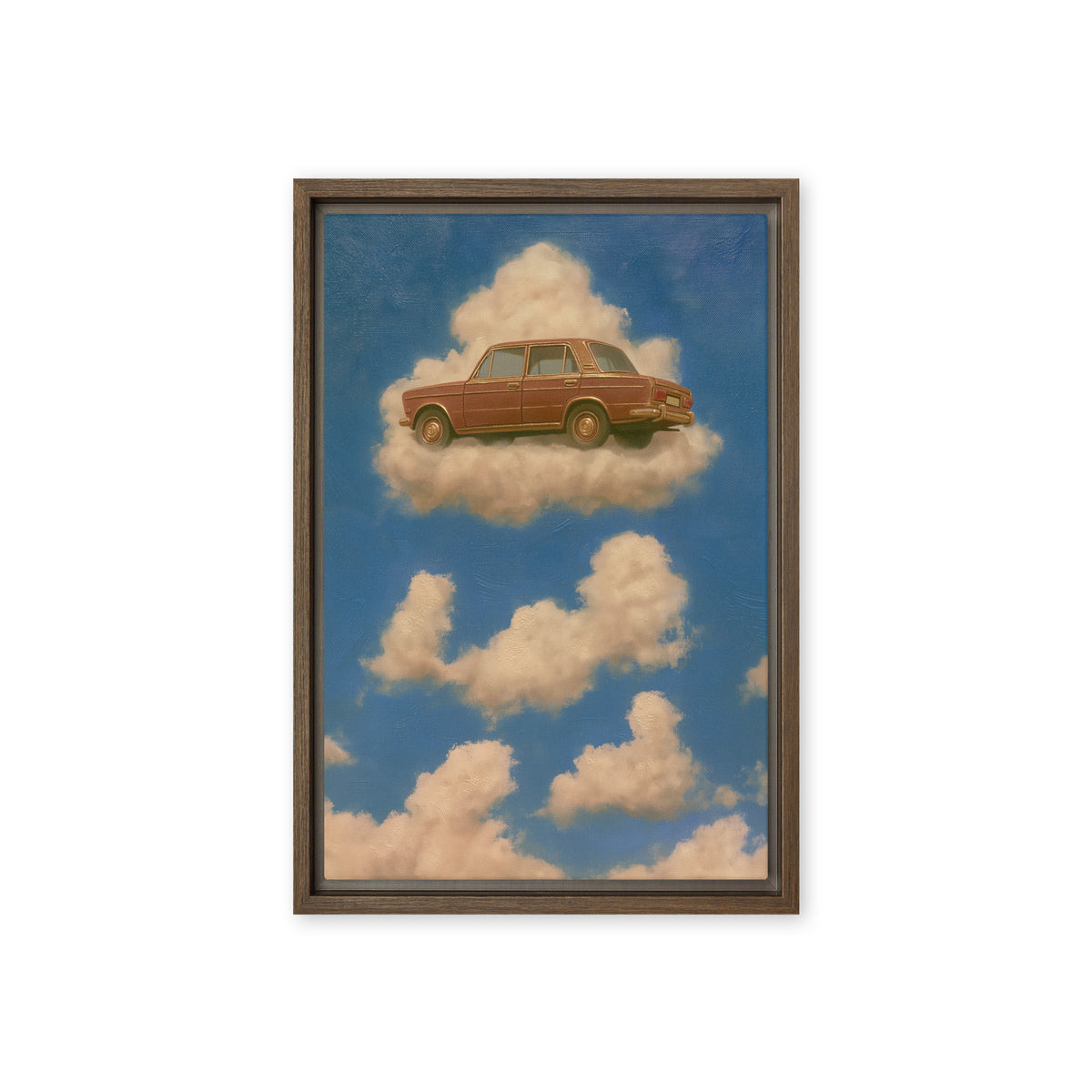 A rust-brown vintage sedan floats on a cream cloud in a blue sky; front view in a brown frame, 12 x 18 in canvas