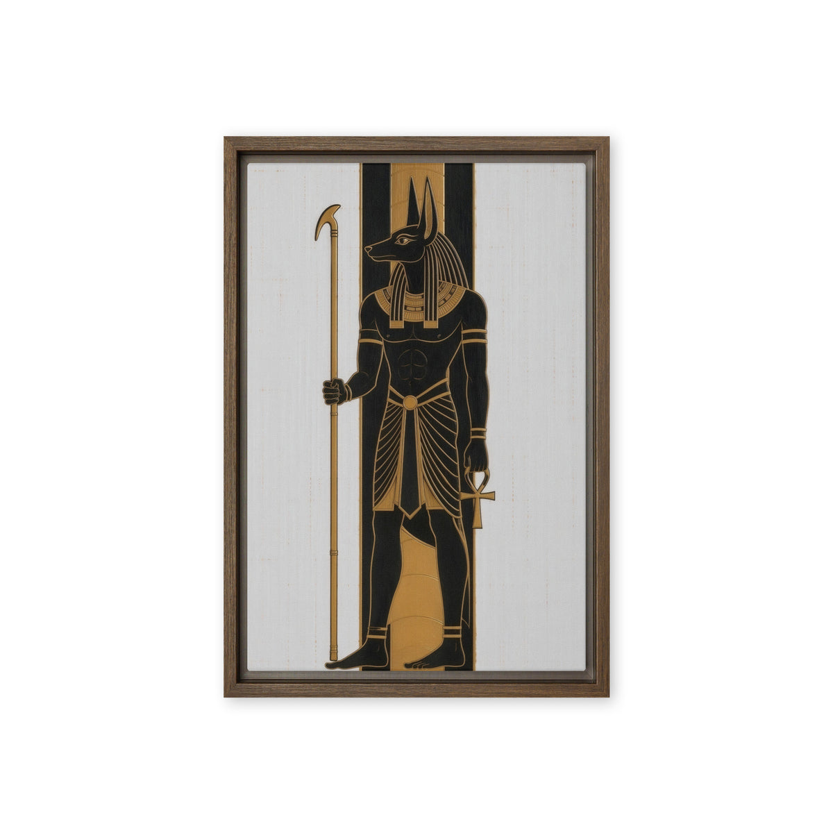 Black and gold Anubis figure holding a staff against pale vertical panels, front view with brown frame, 12″×18″ nominal canvas