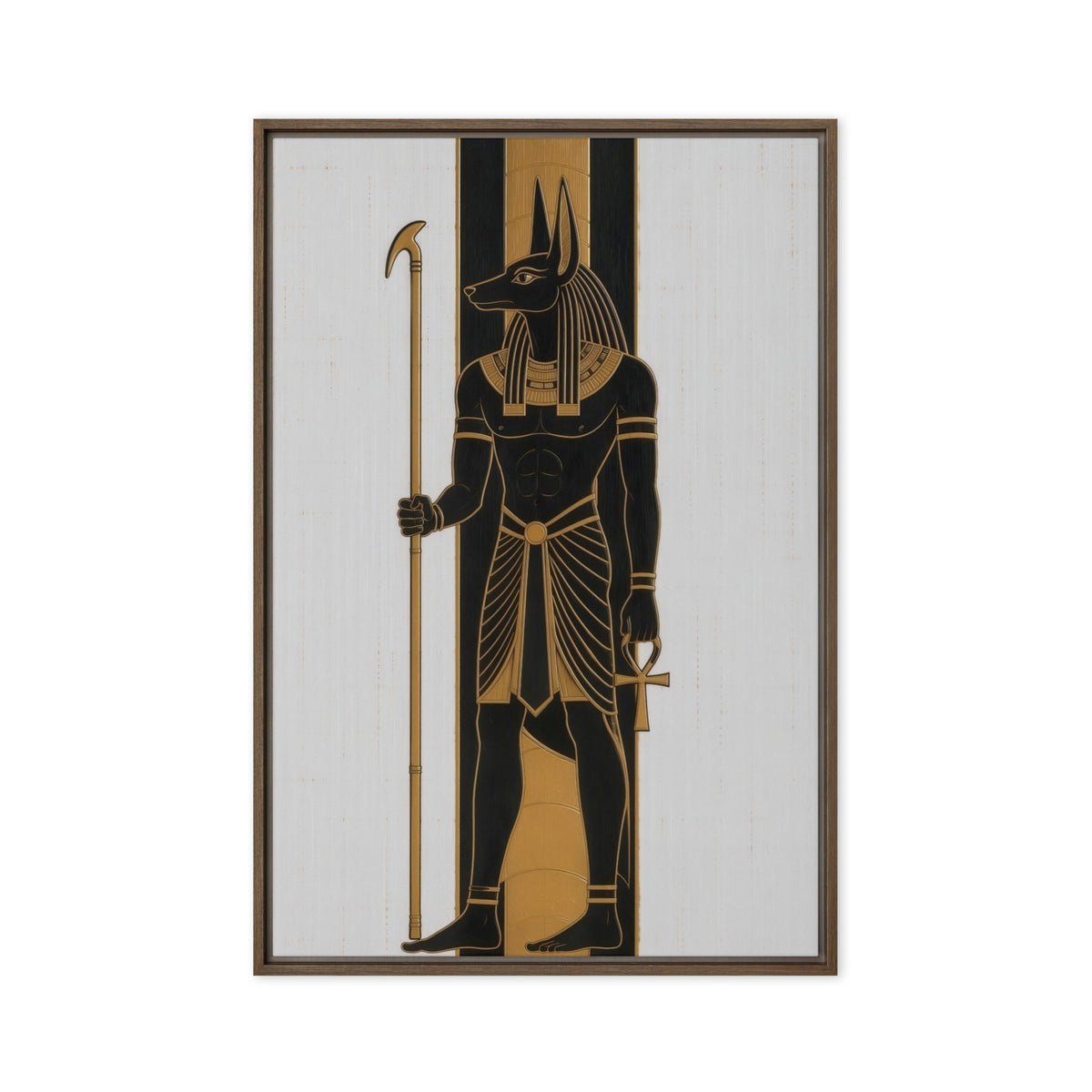 Black and gold Anubis figure holding a staff against pale vertical panels, front view with brown frame, 24″×36″ nominal canvas